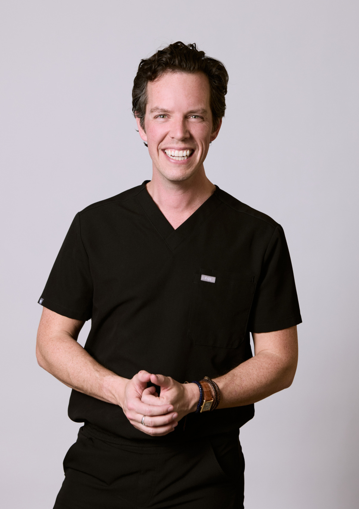 Man smiling at Rochford Orthodontics.